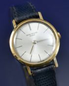 Patek Philippe 18ct gold gentleman's wristwatch with black baton hour markers, silver dial and