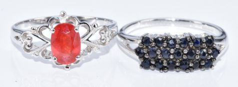 Two 9k white gold rings, one set with an oval cut Padparadscha sapphire of approximately 0.7ct and