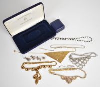 Three diamanté necklaces, four silver charms comprising pear, two apples and a hedgehog, silver