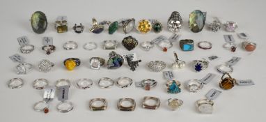 Forty five silver rings including yellow jade, garnet, moonstone, topaz, turquoise, quartz,