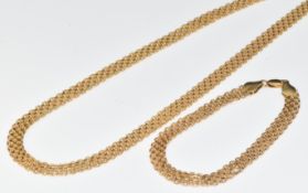 A 14k gold necklace and bracelet made up of fancy links, 11.6g, 46cm & 18cm