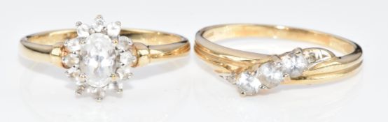 Two 9ct gold rings set with topaz and white sapphires, 3.8g, size N