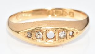 An 18ct gold ring set with diamonds (two missing), Chester 1913, 2.5g, size O/P