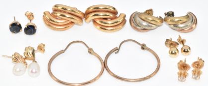 Seven pairs of 9ct gold earrings including sapphire, pearl, hoops, diamonds, etc, 9.5g