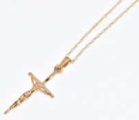 A 9ct gold crucifix and 14k chain, 1.7g