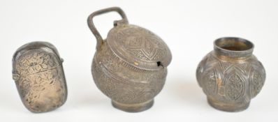 Indian Kutch, Burmese or similar silver handled mustard and small vase or similar, together with a