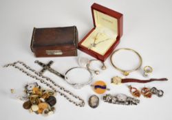 A collection of jewellery including vintage mother of pearl studs, vintage buttons, silver nursing