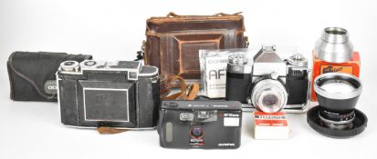 Collectable cameras comprising Zeiss Ikon Contaflex 35mm SLR, Pro-Tessar 1:4 f=115mm lens, Zeiss