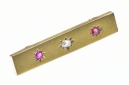 Victorian 15ct gold brooch set with an old cut diamond, a spinel and replacement paste in star