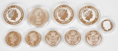 Ten Australian, Cook Islands and Niue silver coins of various denominations, including four 1oz