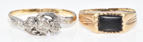 An 18ct gold ring set with three diamonds in a twist platinum setting (1.8g, size I/J) and a 9ct