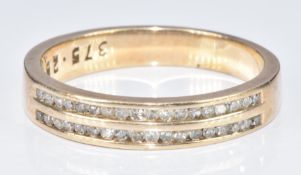 A 9ct gold half eternity ring set with two rows of diamonds, 3.3g, size P