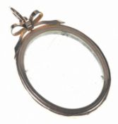 A c1900 9ct gold locket with bow decoration, 8g, 3.2 x 4.5cm