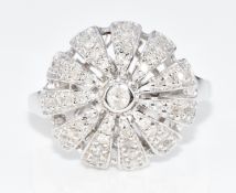 A 9ct white gold ring set with diamonds in a cluster, 6.8g, size N