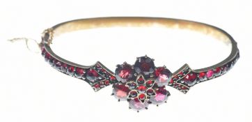 Victorian bangle set with Bohemian cut garnets, 11.4g, 5.9 x 4.6cm