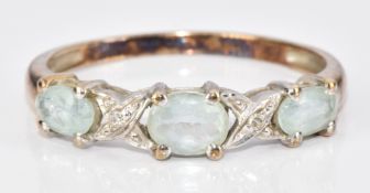 A 9ct gold ring set with aquamarines and diamonds, 1.89g, size P