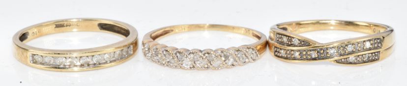 Three 9ct gold rings set with diamonds, 4.8g, sizes N & M