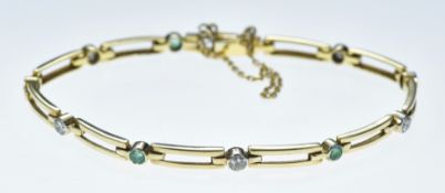 A 9ct gold bracelet set with round cut emeralds and diamonds, each approximately 0.1ct, 8g, 18cm