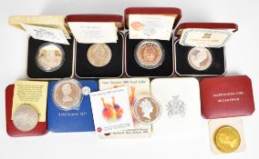 Eight silver all world coins including Ascension Islands, Falklands, New Zealand, Macau and