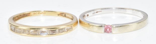 A 14ct gold ring set with cubic zirconia (2g, size U) and a 9ct white gold ring set with a round cut