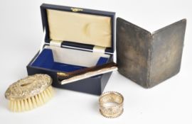 Art Deco hallmarked silver cigarette case with engine turned decoration and gold button,