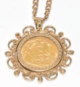 A 9ct gold pendant set with a 1908 gold half sovereign, on 9ct gold chain, 18.1g, 70cm