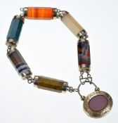 Victorian yellow metal bracelet made up of octagonal agate beads, the padlock clasp set with