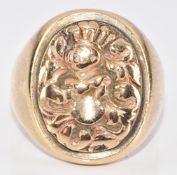 A 9ct gold ring with embossed decoration, 13.1g, size S