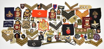 Large quantity of British insignia, badges, patches, buttons, etc including some WW2 examples