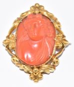 Victorian yellow metal brooch set with carved coral cameo depicting a young woman, 7.5g, 2.6 x 3.