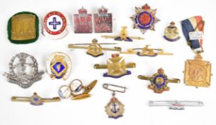 Collection of vintage gilt, silver metal and enamel badges including a selection of sweetheart