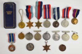 Eighteen military and commemorative medals, mostly British WW2, including two 1939-45 Stars, Pacific
