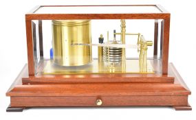 Russell Norwich mahogany cased barograph with bevelled glass panels and chart drawer below, the