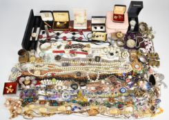 A collection of jewellery including eighteen pairs of silver earrings, beaded necklaces, watches,