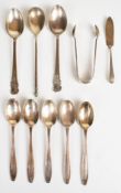 Hallmarked silver cutlery to include a set of five tea or coffee spoons, butter knife and a pair