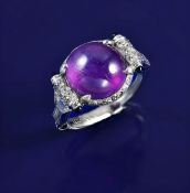 Art Deco 18ct and platinum ring set with a natural pink star sapphire cabochon of approximately 9ct,