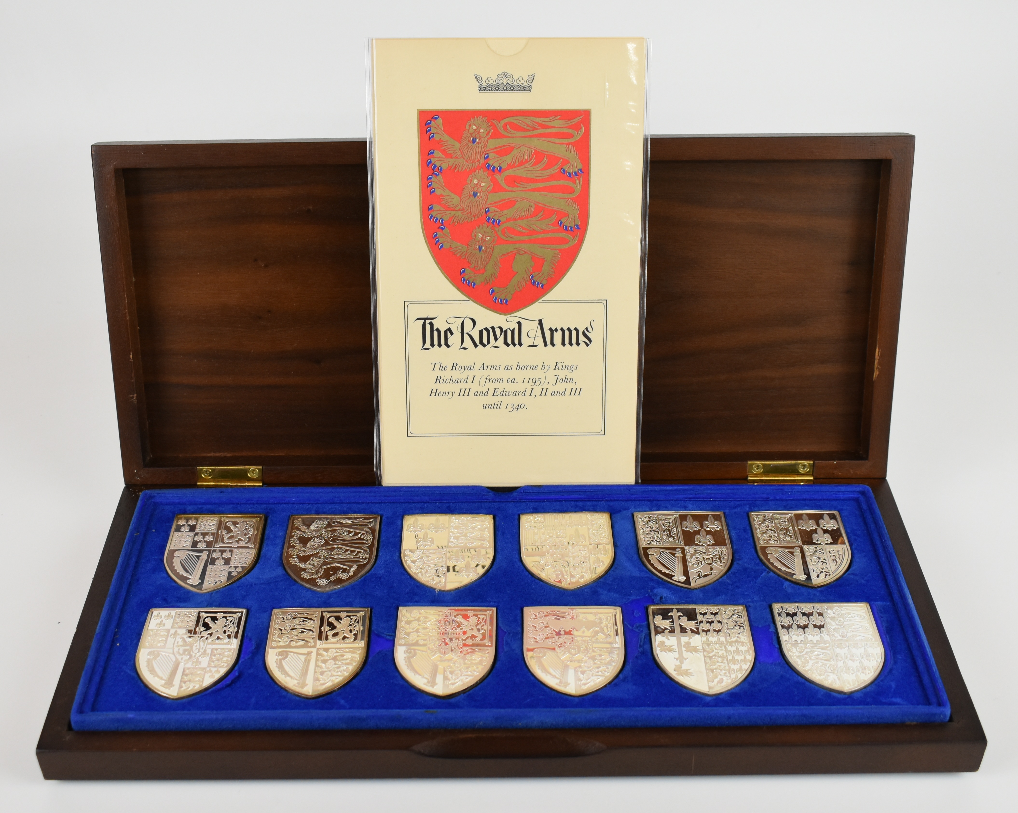 Yorkshire Mint cased set of 12 hallmarked silver commemorative Royal Arms shield shaped