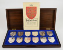 Yorkshire Mint cased set of 12 hallmarked silver commemorative Royal Arms shield shaped
