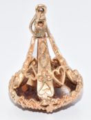 A 9ct gold charm in the form of a fob set with paste, 9.4g, 3cm