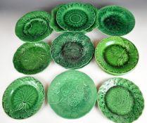 Fourteen pieces of 19thC green majolica table / dessert ware, four impressed Wedgwood including