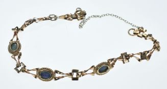 A 9ct gold bracelet set with opal triplets, 3.7g, 16cm (opals are in poor condition)