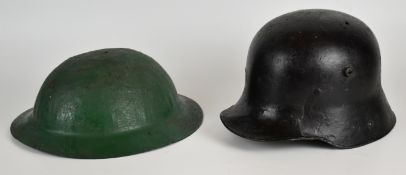 Two WW1 steel helmets, comprising a Imperial German M16 helmet shell, with faint 66 stamp, by repute