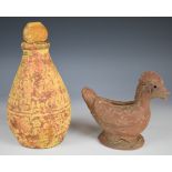 Eastern pottery terracotta figure of a chicken and a pottery bottle with moulded decoration, tallest