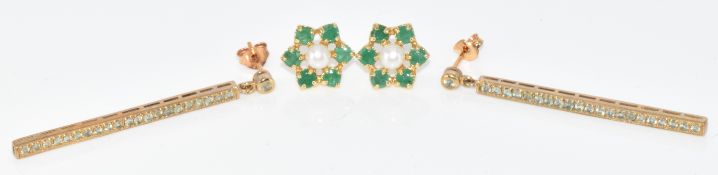 Two pairs of 9ct gold earrings, one pair set with alexandrite and the other a freshwater pearl