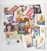 Royal Mint coin packs and first day covers comprising eighteen crowns and £5 pieces, eleven £2,