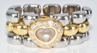 Chopard 'Happy Diamond' ring set with diamonds and to the centre a blue diamond, 12.5g, size N