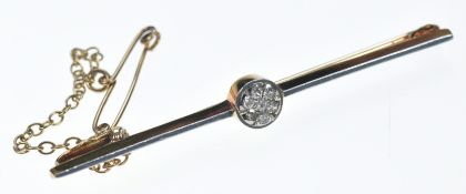 A 15ct gold c1920 brooch set with diamonds in a cluster, 3.4g, 5cm