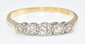 An 18ct gold ring set with five diamonds in a platinum setting, in antique box, 2.3g, size Q