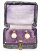 A pair of 9ct gold earrings set with cultured pearls, in antique box, 1.2g