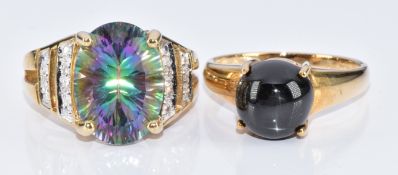 Two 9ct gold rings, one set with quartz and topaz and the other star diopside, with certificates,